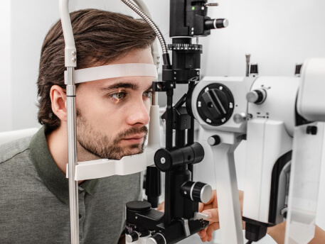 man undergoing eye-exam premier eye