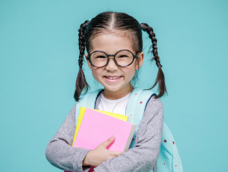 smiling girl wearing eye glass