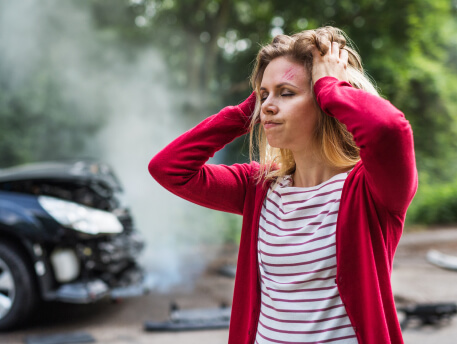 woman experiencing head ache